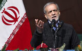 President Masoud Pezeshkian speaks during a rally commemorating anniversary of 1979 Islamic Revolution in Tehran, Iran, February 10, 2025. (Iranian Presidency Office via AP)