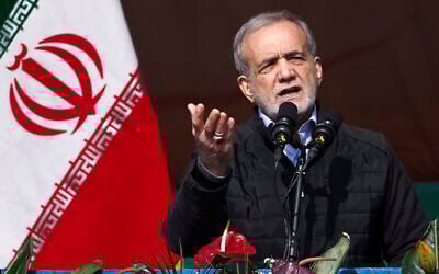 President Masoud Pezeshkian speaks during a rally commemorating anniversary of 1979 Islamic Revolution in Tehran, Iran, February 10, 2025. (Iranian Presidency Office via AP)