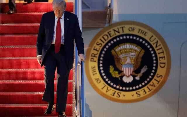 US President Donald Trump walks down the stairs of Air Force One upon his arrival at Joint Base Andrews, Md., Sunday, March 30, 2025. (AP Photo/Luis M. Alvarez) US President Donald Trump walks down the stairs of Air Force One upon his arrival at Joint Base Andrews, Md., Sunday, March 30, 2025. (AP Photo/Luis M. Alvarez)