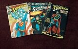 An undated photo shows three editions of the 'Superman' comic book. (AP Photo/ Ed Bailey)