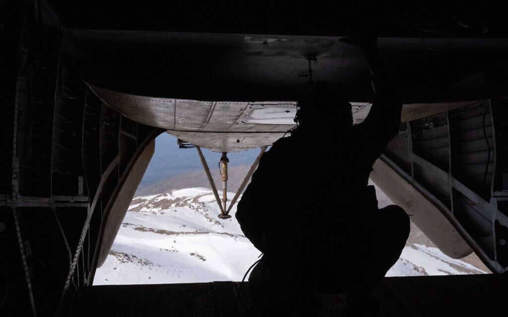 An Israeli Air Force helicopter prepares to land in the Mount Hermon area in southern Syria, March 11, 2025. (Emanuel Fabian/Times of Israel)