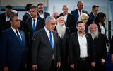 Prime Minister Benjamin Netanyahu (second from L) poses for a photo with his cabinet at the Bible Lands Museum in Jerusalem on June 5, 2024. Attorney General Gali Baharav-Miara is seen in the second row, second from the right. (Yonatan Sindel/Flash90)