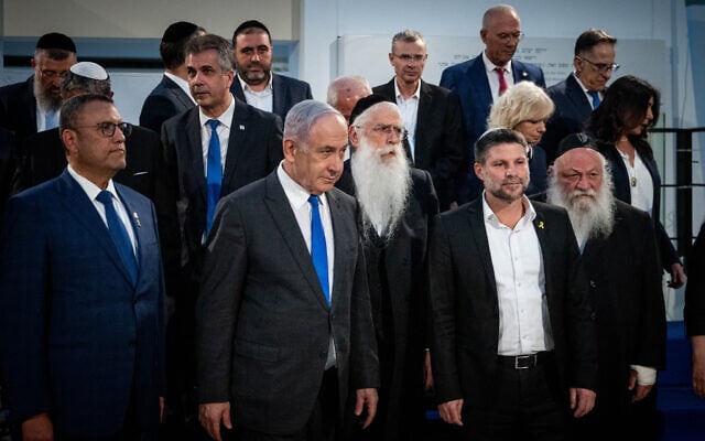 Prime Minister Benjamin Netanyahu (second from L) poses for a photo with his cabinet at the Bible Lands Museum in Jerusalem on June 5, 2024. Attorney General Gali Baharav-Miara is seen in the second row, second from the right. (Yonatan Sindel/Flash90) Prime Minister Benjamin Netanyahu (second from L) poses for a photo with his cabinet at the Bible Lands Museum in Jerusalem on June 5, 2024. Attorney General Gali Baharav-Miara is seen in the second row, second from the right. (Yonatan Sindel/Flash90)