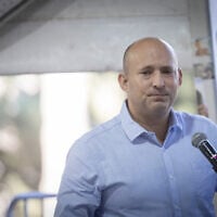 Naftali Bennett attends a commemoration ceremony for a slain Israeli soldier at Mt. Herzl military cemetery in Jerusalem, December 25, 2024. (Chaim Goldberg/ Flash90/ File)
