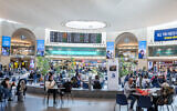 Passengers at the Duty Free in the Ben Gurion International airport near Tel Aviv on January 26, 2024. (Nati Shohat/Flash90)