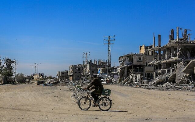 Palestinians live among the rubble of their homes which were destroyed in the war between Israel and Hamas, on a road near the Kerem Shalom crossing, east of the city of Rafah, in the southern Gaza Strip, March 2, 2025. (Abed Rahim Khatib/Flash90) Palestinians live among the rubble of their homes which were destroyed in the war between Israel and Hamas, on a road near the Kerem Shalom crossing, east of the city of Rafah, in the southern Gaza Strip, March 2, 2025. (Abed Rahim Khatib/Flash90)