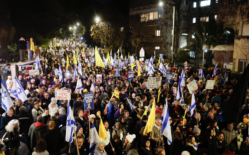 People protest calling for the release of hostages held in the Gaza Strip, outside the Prime Minister's Residence in Jerusalem, March 2, 2025. (Chaim Goldberg/ Flash90)