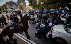 Haredi Jews clash with police during a protest against the ultra-Orthodox draft on Road 4 outside Bnei Brak on March 2, 2025 (Photo by Yonatan Sindel/Flash90)