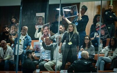 Bereaved families, hostages' families and survivors of the October 7 massacre react as Prime Minister Benjamin Netanyahu speaks during a 40-signatures debate in the Knesset, March 3, 2025. (Chaim Goldberg/Flash90)