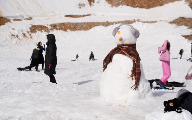 Israelis enjoy the snow in Mount Hermon, in northern Israel, on March 4, 2025. (Ayal Margolin/Flash90) Israelis enjoy the snow in Mount Hermon, in northern Israel, on March 4, 2025. (Ayal Margolin/Flash90)