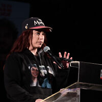 Former hostage Ilana Gritzewsky speaks during a rally calling for the release of hostages held by terrorists in Gaza, at Hostages Square in Tel Aviv, March 8, 2025. (Avshalom Sassoni/Flash90)