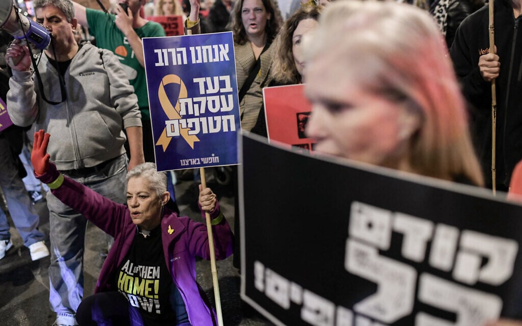 Demonstrators protest calling for the release of Israeli hostages held in the Gaza Strip outside Hakirya Base in Tel Aviv, March 9, 2025. (Tomer Neuberg/Flash90)