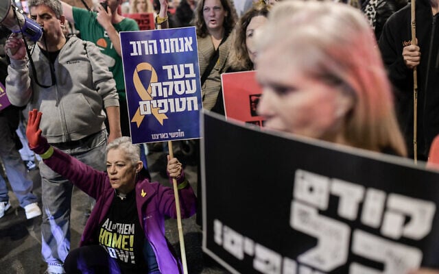 Demonstrators protest calling for the release of Israeli hostages held in the Gaza Strip outside Hakirya Base in Tel Aviv, March 9, 2025. (Tomer Neuberg/Flash90)