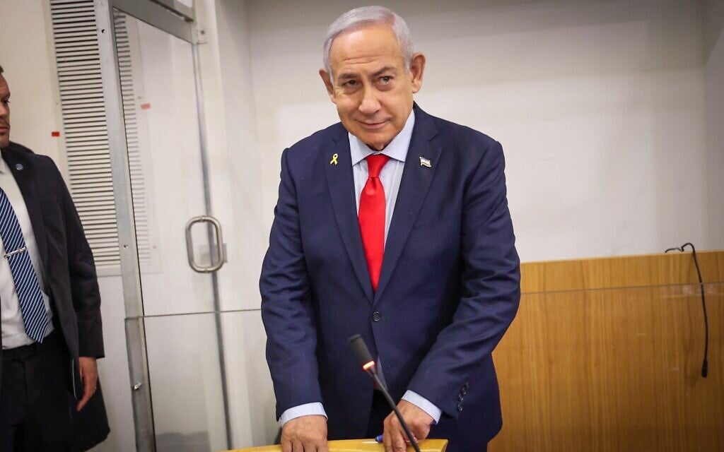 Prime Minister Benjamin Netanyahu arrives to the courtroom at the District court in Tel Aviv, March 10, 2025 (KOKO/POOL)