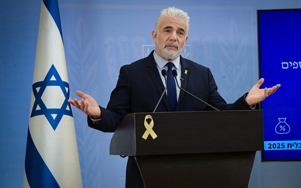Yesh Atid head MK Yair Lapid speaks during a press conference in Tel Aviv on March 11, 2025. (Avshalom Sassoni/ Flash90)
