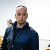 Eli Feldstein, one of the suspects in the classified documents leak case, arrives for a hearing at the Tel Aviv District Court on March 11, 2025. (Yehoshua Yosef/Flash90)