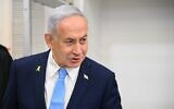 Prime Minister Benjamin Netanyahu arrives at the Tel Aviv Distrcit Court before a hearing in his corruption trial, March 12, 2025. (Yair Sagi/Pool)