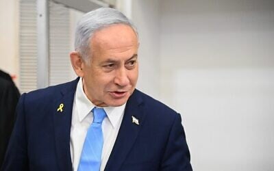 Prime Minister Benjamin Netanyahu arrives at the Tel Aviv Distrcit Court before a hearing in his corruption trial, March 12, 2025. (Yair Sagi/Pool)