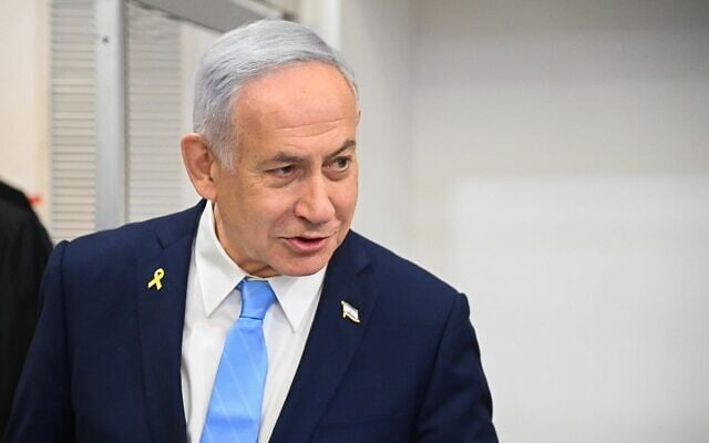 Prime Minister Benjamin Netanyahu arrives at the Tel Aviv Distrcit Court before a hearing in his corruption trial, March 12, 2025. (Yair Sagi/Pool) Prime Minister Benjamin Netanyahu arrives at the Tel Aviv Distrcit Court before a hearing in his corruption trial, March 12, 2025. (Yair Sagi/Pool)