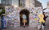Visitors at Hostage Square in Tel Aviv. March 13, 2025. (Avshalom Sassoni/Flash90)