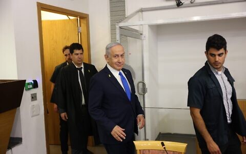 Prime Minister Benjamin Netanyahu arrives at the Distrcit Court in Tel Aviv, before the start of testimony in his trial against him, March 17, 2025 (Tomer Appelbaum/POOL)