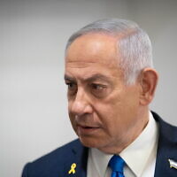 Prime Minister Benjamin Netanyahu arrives to the courtroom at the Tel Aviv District Court to testify in his criminal trial, March 17, 2025. (Tomer Appelbaum/POOL)