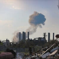 Smoke rises after an Israeli airstrike in Gaza City, March 18, 2025. (Ali Hassan/Flash90)