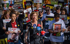 Families of Israelis held hostage in Gaza and supporters hold a press statement outside the Knesset in Jerusalem, March 18, 2025. (Yonatan SIndel/Flash90)