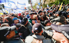 Israelis attending a protest march against the government of Prime Minister Benjamin Netanyahu clash with police in Jerusalem, March 19, 2025. (Yonatan Sindel/Flash90)