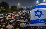 Demonstrators protest against the decision of Prime Minister Benjamin Netanyahu to fire head of Shin Bet Ronen Bar, outside the Prime Minister's Office in Jerusalem, March 20, 2025. (Chaim Goldberg/Flash90)