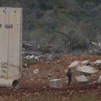Israeli soldiers guard along the border wall with Lebanon, northern Israel, March 22, 2025. (Ayal Margolin/Flash90)