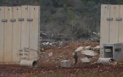 Israeli soldiers guard along the border wall with Lebanon, northern Israel, March 22, 2025. (Ayal Margolin/Flash90)