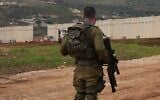Israeli soldiers guard the Israeli border fence with Lebanon, northern Israel, March 22, 2025. (Ayal Margolin/Flash90)