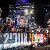 Demonstrators demand the release of Israelis held hostage in the Gaza Strip, outside the Defense Ministry headquarters in Tel Aviv, March 23, 2025. (Avshalom Sassoni/Flash90)