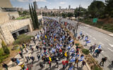 Israelis attend a protest march against the firing of Attorney General Gali Baharav-Miara in Jerusalem, March 23, 2025. (Chaim Goldberg/Flash90)