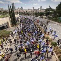 Israelis attend a protest march against the firing of Attorney General Gali Baharav-Miara in Jerusalem, March 23, 2025. (Chaim Goldberg/Flash90)