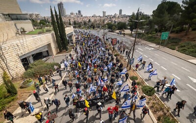 Israelis attend a protest march against the firing of Attorney General Gali Baharav-Miara in Jerusalem, March 23, 2025. (Chaim Goldberg/Flash90)