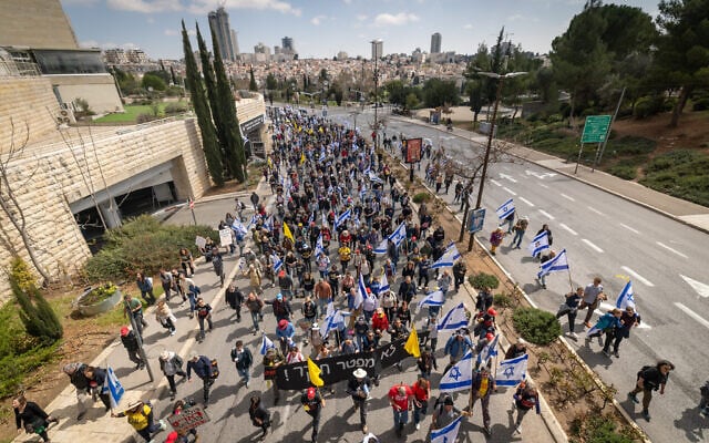 Israelis attend a protest march against the firing of Attorney General Gali Baharav-Miara in Jerusalem, March 23, 2025. (Chaim Goldberg/Flash90) Israelis attend a protest march against the firing of Attorney General Gali Baharav-Miara in Jerusalem, March 23, 2025. (Chaim Goldberg/Flash90)