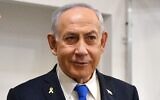 Prime Minister Benjamin Netanyahu arrives for a hearing in his corruption trial at the Tel Aviv District Court, March 24, 2025. (Reuven Kastro/Pool)