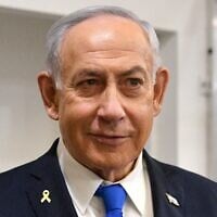 Prime Minister Benjamin Netanyahu arrives for a hearing in his corruption trial at the Tel Aviv District Court, March 24, 2025. (Reuven Kastro/Pool)