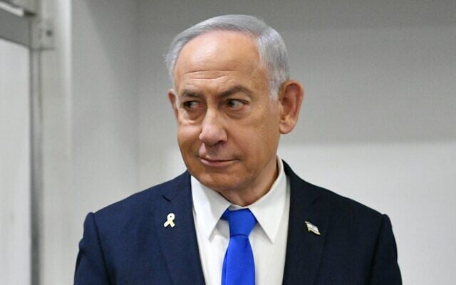 Prime Minister Benjamin Netanyahu arrives at Tel Aviv District Court to testify in the criminal trial against him, March 24, 2025. (Reuven Kastro/POOL)