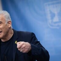 Opposition Leader and head of the Yesh Atid party MK Yair Lapid leads a faction meeting at the Knesset on March 24, 2025. (Yonatan Sindel/ Flash90)