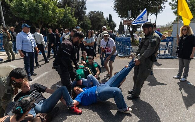 Police clash with demonstrators during an anti-government protest outside the Knesset in Jerusalem, March 25, 2025. (Chaim Goldberg/Flash90) Police clash with demonstrators during an anti-government protest outside the Knesset in Jerusalem, March 25, 2025. (Chaim Goldberg/Flash90)