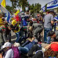 Israelis protest against the government outside the Knesset, in Jerusalem, March 25, 2025 (Chaim Goldberg/Flash90)