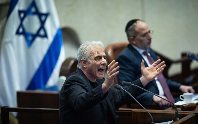 Opposition leader Yair Lapid addresses the Knesset ahead of a vote on the state budget on March 25, 2025.(Yonatan Sindel/Flash90)