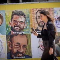 Posters of Israelis held hostage by Hamas terrorists in Gaza are seen at the Sarona Market in Tel Aviv, March 26, 2025. (Miriam Alster/Flash90)