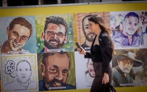 Posters of Israelis held hostage by Hamas terrorists in Gaza are seen at the Sarona Market in Tel Aviv, March 26, 2025. (Miriam Alster/Flash90)