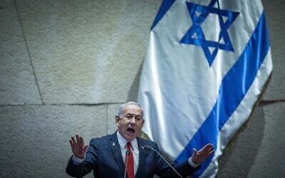 Prime Minister Benjamin Netanyahu speaks in the Knesset on March 26, 2025. (Yonatan Sindel/Flash90)