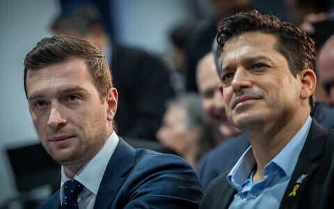 France's National Rally leader Jordan Bardella (right) and Diaspora Minister Amichai Chikli at the international conference on combating antisemitism in Jerusalem, March 27, 2025 (Yonatan Sindel/Flash90)
