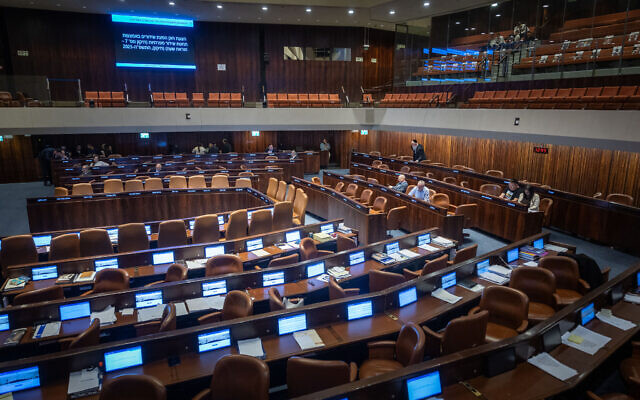 A mainly empty plenum session at the assembly hall of the Knesset, in Jerusalem on March 31, 2025 (Yonatan Sindel/Flash90) A mainly empty plenum session at the assembly hall of the Knesset, in Jerusalem on March 31, 2025 (Yonatan Sindel/Flash90)